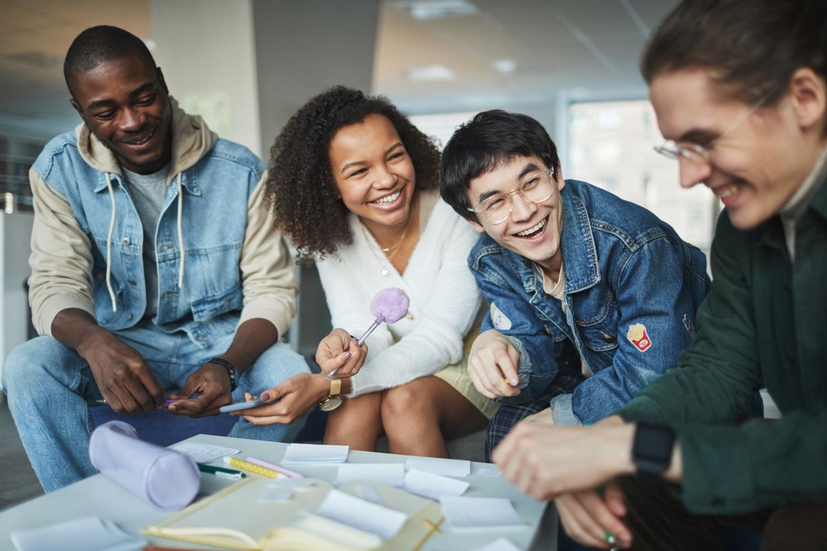 A diverse group of university students working together